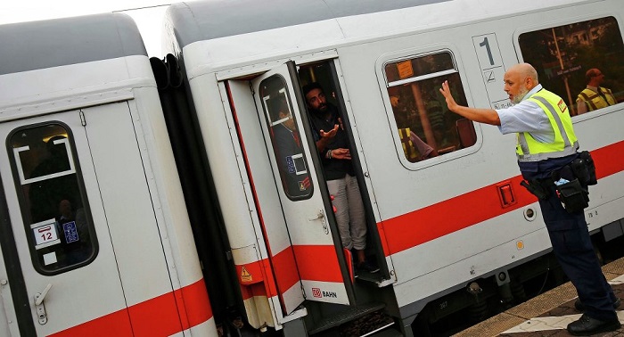 Refugee spends hours on top moving train in desperate attempt to get to Germany